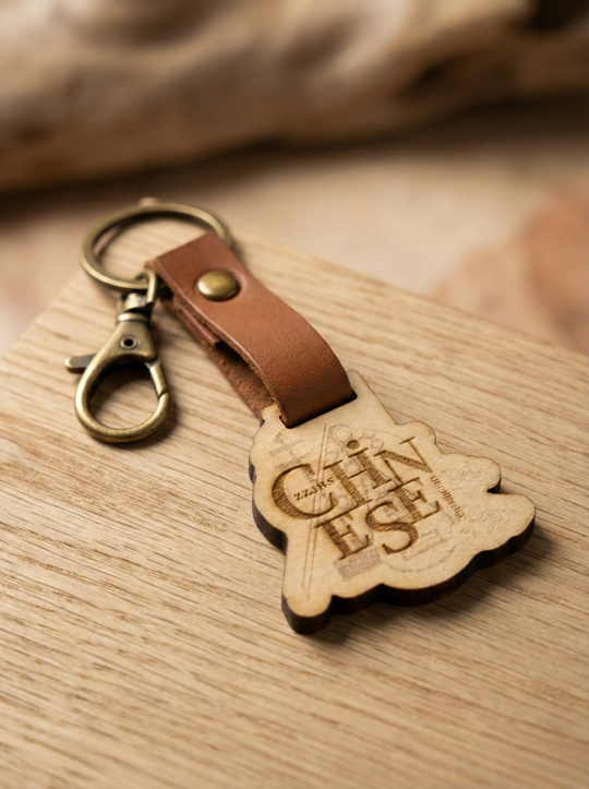 客製雷雕-皮革吊飾造型 珍珠娛樂客製化商品:中正國樂團吊飾